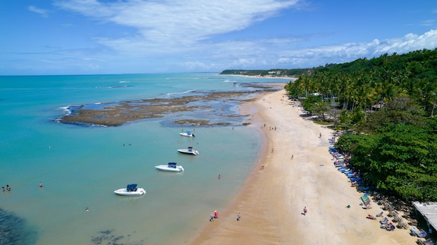 Aerial view of Praia do Espelho Porto Seguro Bahia Brazil Natural pools in the sea cliffs and greenish water