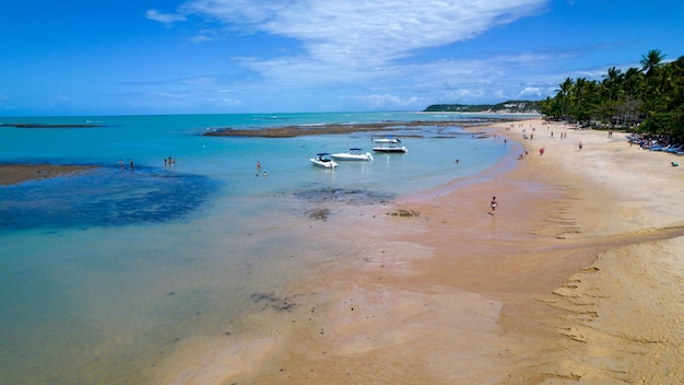 Aerial view of Praia do Espelho Porto Seguro Bahia Brazil Natural pools in the sea cliffs and greenish water