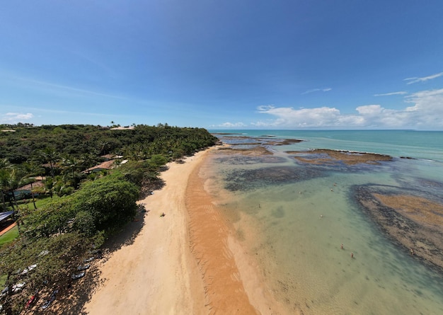 Aerial view of Praia do Espelho Porto Seguro Bahia Brazil Natural pools in the sea cliffs and greenish water