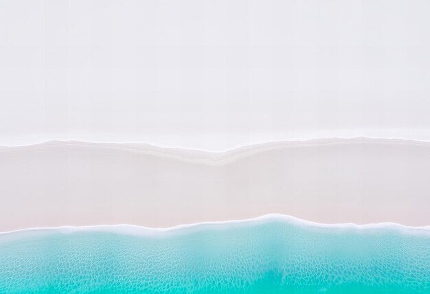 Photo aerial view of a pristine white sandy beach meeting the turquoise ocean