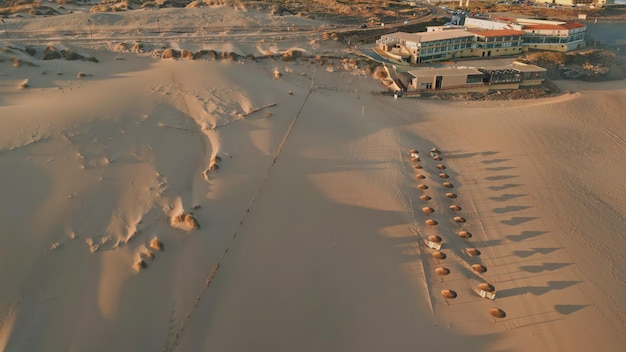 Aerial view resort city at summer sunlight drone panorama cozy beach complex