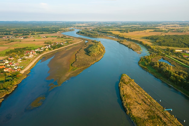 Aerial view of the river, fields and tree, beautiful rural landscape, Poland