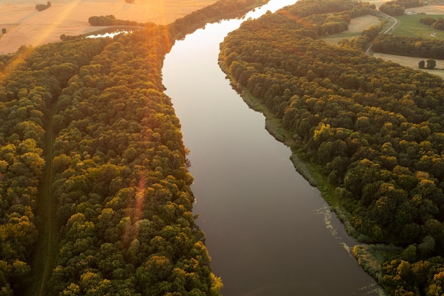 Aerial view of the river at sunset in summer