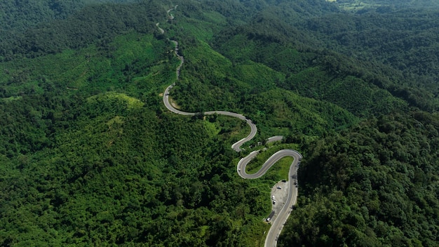 Aerial view ROAD No1081 of winding mountain road between Pua Ddistric Nan Province Thailand is highlignt that tourist like to take pictures