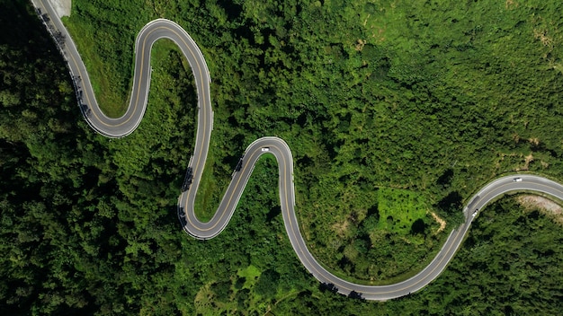 Aerial view ROAD No1081 of winding mountain road between Pua Ddistric Nan Province Thailand