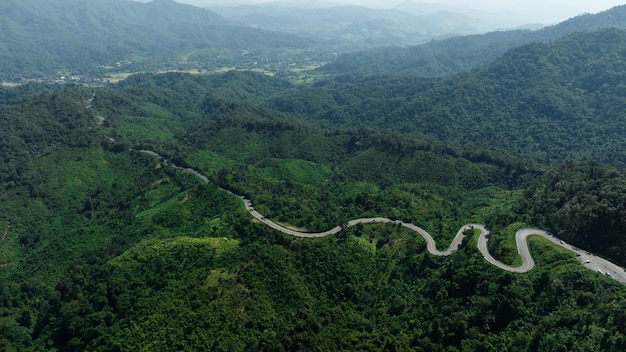 Aerial view ROAD No1081 of winding mountain road between Pua Ddistric Nan Province