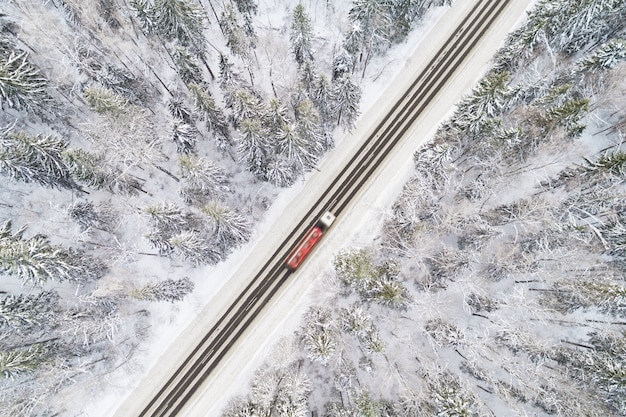 Aerial view of road in winter forest