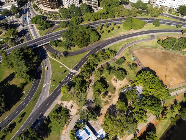 Aerial view of Rodrigo de Freitas Lagoon south zone of Rio de Janeiro Brazil In the background the beaches of Ipanema and Leblon Sunny day Cars traveling on Avenida Epitacio Pessoa Drone photo