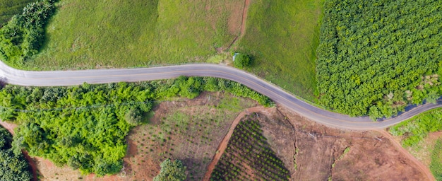 Aerial view of Rural road in countryside area, view from drone