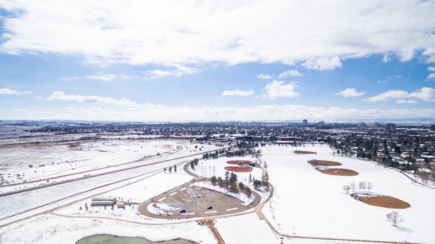 Aerial view of school sport fields in the Winter.