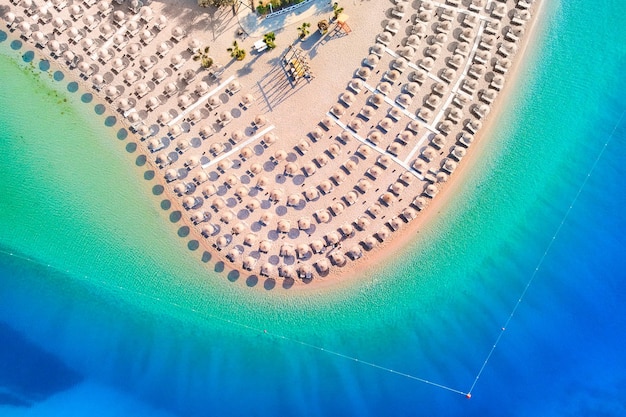 Aerial view of sea bay with sandy beach at sunny day in summer Drone photo of Blue lagoon in Oludeniz Turkey