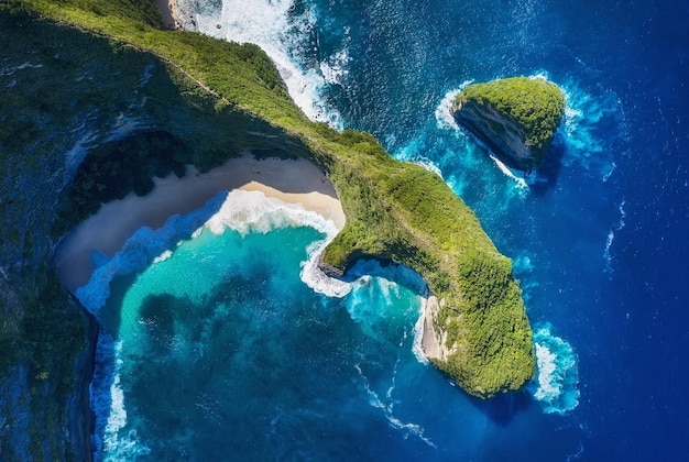 Aerial view at sea and rocks Turquoise water background from top view Summer seascape from air Kelingking beach Nusa Penida Bali Indonesia Travel image