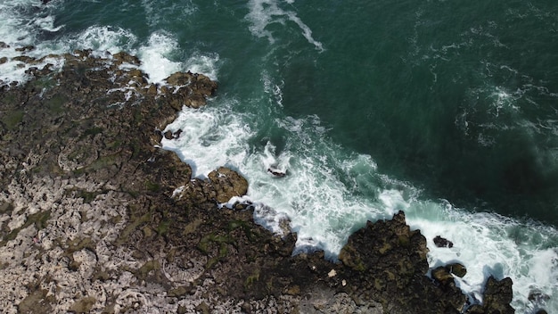 Aerial view of sea waves and fantastic cliffs rocky coast Tyulenovo Bulgaria