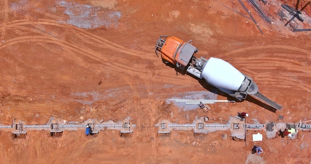 Aerial view showing concrete columns being poured in a new building