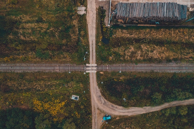 Aerial view shows the intersection of the railway tracks in the field