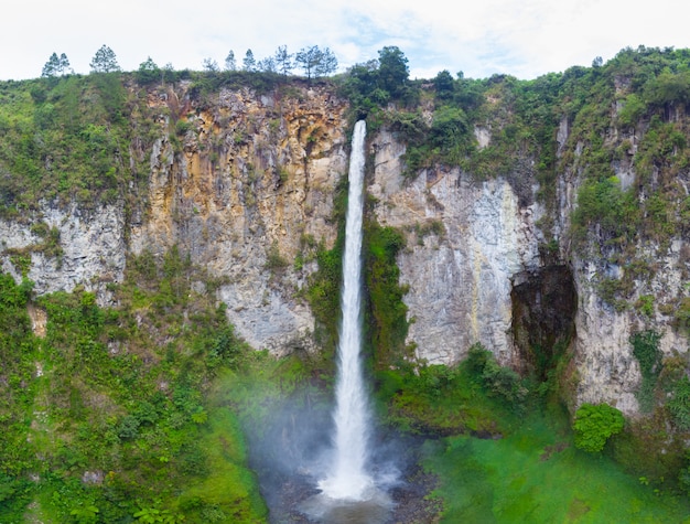 Aerial view Sipiso-piso waterfall in Sumatra, travel destination in Berastagi and Lake Toba, Indonesia