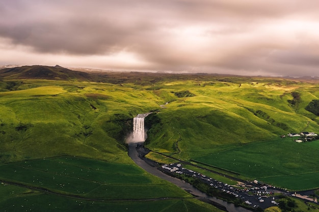 Aerial view of the skogafoss waterfall in southern iceland at sunset