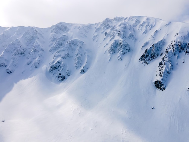 Aerial view of snow mountain range landscape in Slovakia Rocks ridges landscape in the mountains nature landscape