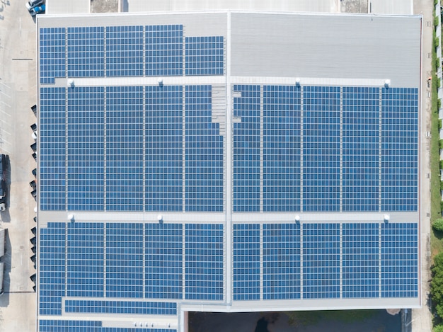 Aerial View of Solar Panel on Factory Rooftop