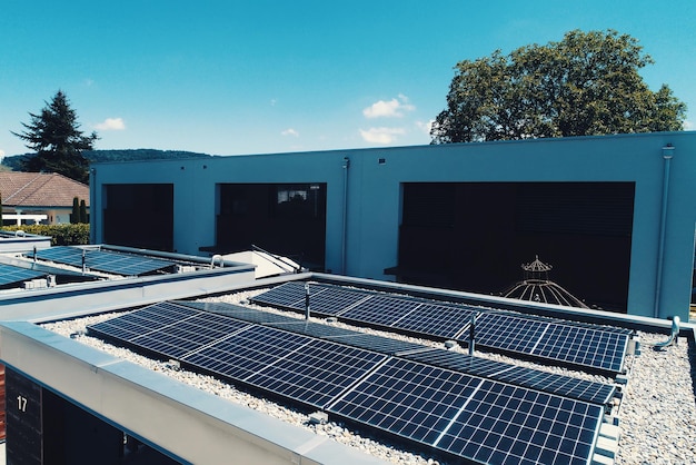 Aerial view of solar panels or solar cells on the roof of house Power plant renewable clean energy source Eco technology for electric power in industry