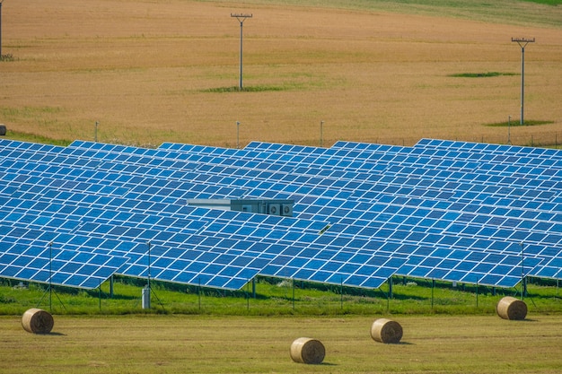 Aerial view to solar power plant. Industrial renewable resources theme.