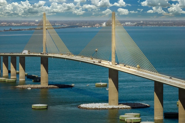 Aerial view of Sunshine Skyway Bridge over Tampa Bay in Florida with moving traffic Concept of transportation infrastructure