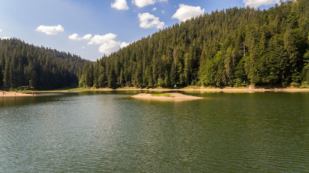 Aerial view of the synevyr lake. The largest lake in the Carpathians.