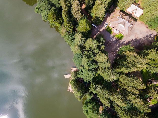 Aerial view of synevyr lake in Ukrainian carpathian mountains copy space