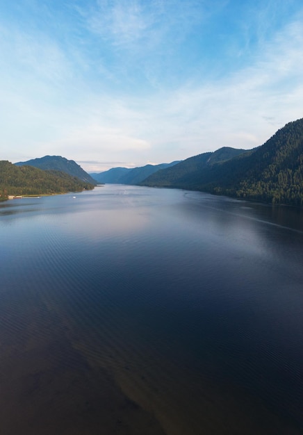 Aerial view on teletskoye lake in altai mountains siberia russia drone shot beauty summer day