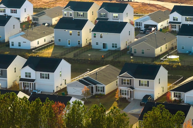 Aerial view of tightly located new family houses in South Carolina suburban area Real estate development in american suburbs