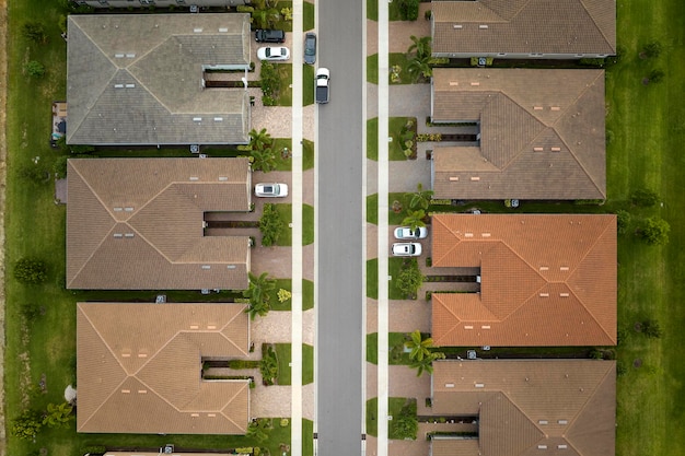 Aerial view of tightly packed homes in Florida closed living clubs Family houses as example of real estate development in american suburbs