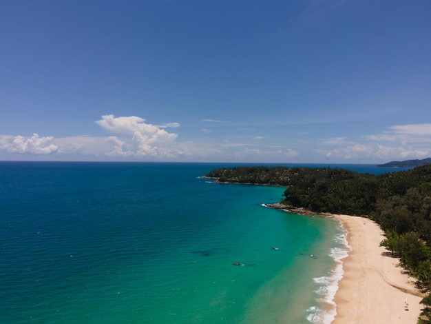 Aerial view tropical beach and sea Top down view of drone. Andaman sea Phuket Thailand.