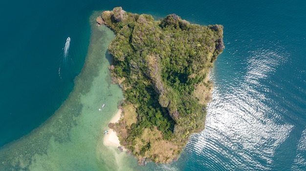 aerial view of tropical islands, beaches and boats in blue clear Andaman sea water from above, beautiful archipelago islands of Krabi, Thailand