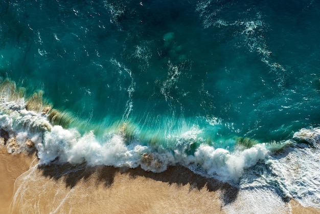 Aerial view of tropical ocean with waves in Nusa penida Bali Indonesia