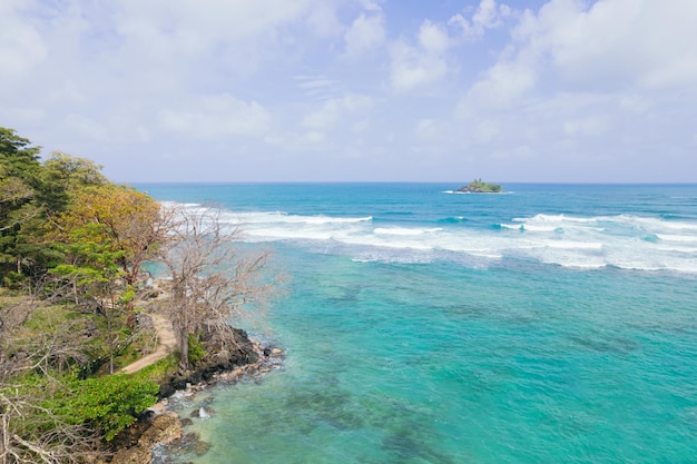 Aerial view of a tropical paradise like beach with crystal clear turquoise water