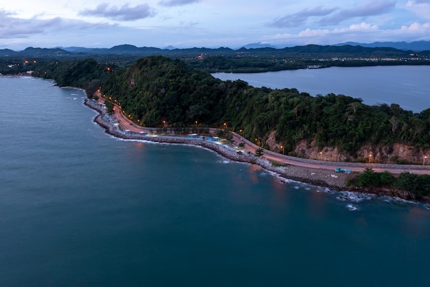 Aerial view twilight sea and landscape of Noen Nangphaya in Chanthaburi Thailand landmark and view point travel beautiful highway along with the rocky coastline mountain island chanthaburi province