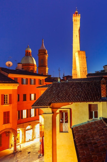 Aerial view of two towers asinelli and garisenda both of them leaning symbol of bologna and church o