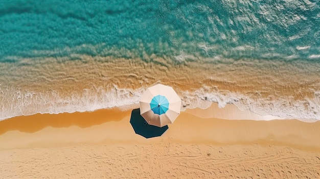 Aerial view of umbrella on the sandy beach with blue sea wave background