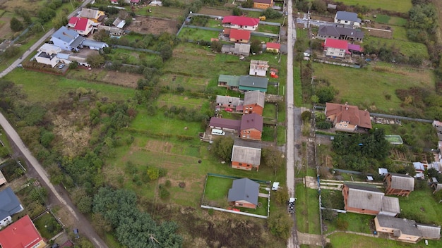 Aerial view of village rural landscape with after harvest in beautiful autumn