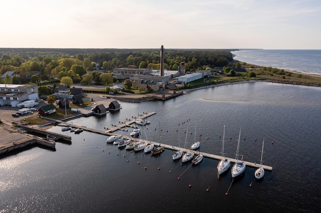 Aerial view of yachts at the pier of a seaside fishing village Engure Latvia