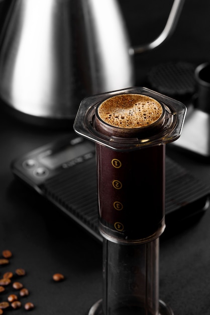 AeroPress on black surface 