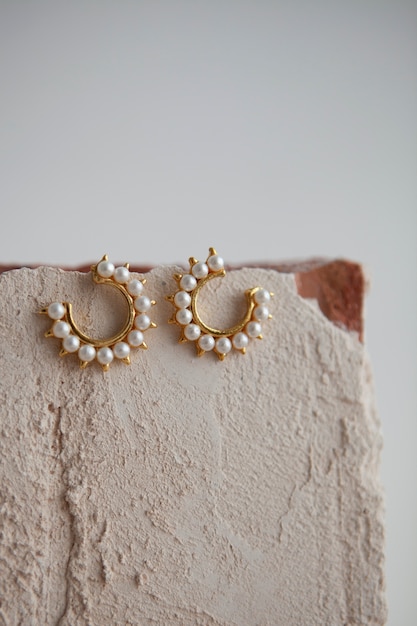 Aesthetic golden earrings with pearls