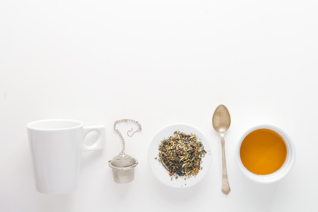 Photo aesthetic image of herbal tea metal teapot mug and honey on a white background