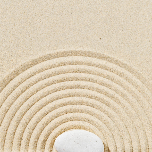 Aesthetic minimal background with zen stones on sand Pattern in Japanese Zen Garden with circles