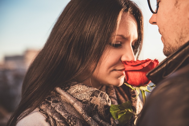 Affectionate Couple with red rose