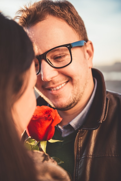 Affectionate Couple with red rose