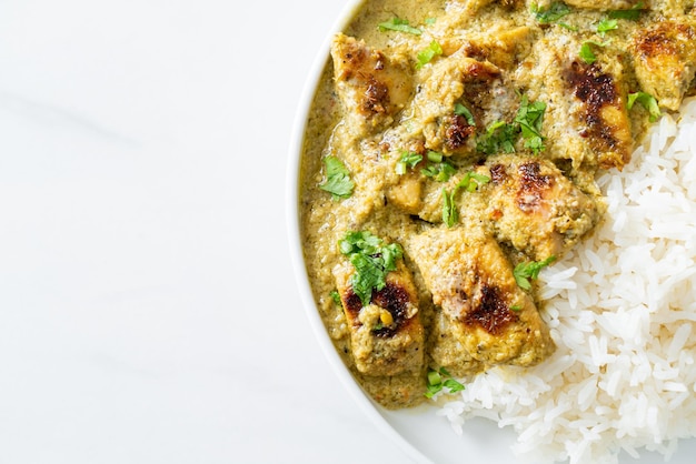 Afghani chicken in green curry or Hariyali tikka chicken hara masala with rice