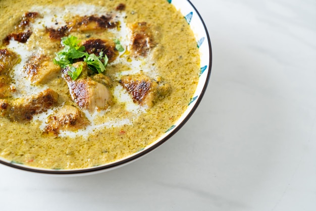 Afghani chicken in green curry or Hariyali tikka chicken hara masala