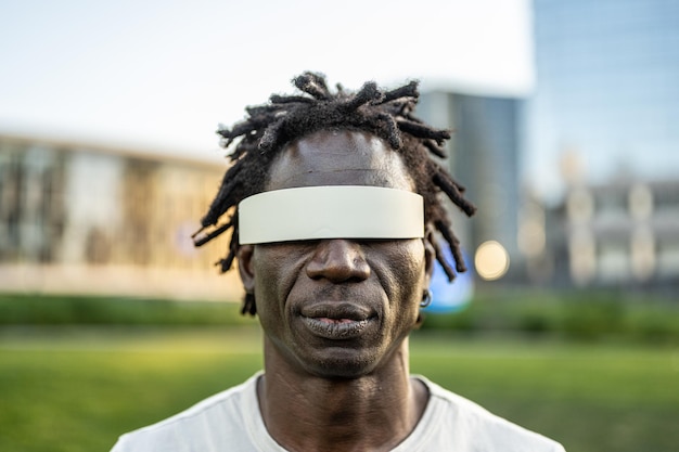 African adult ma wearing hitech goggles fo augmented reality futiristic lifestyle