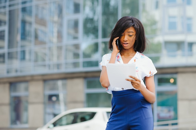 African american business woman talking on a cell phone